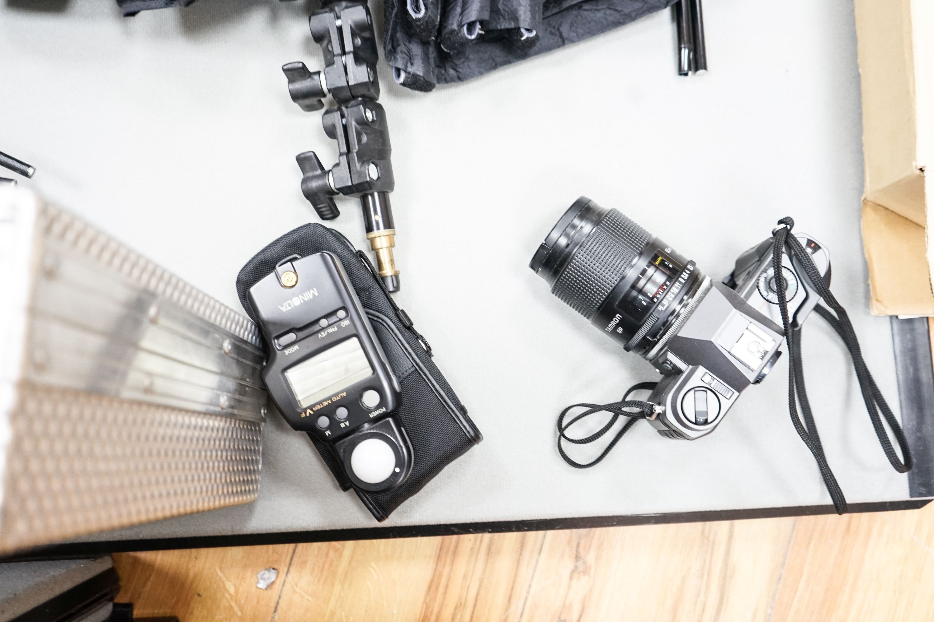 Professional photography equipment including a Pentax P30T SLR camera with Tamron 90mm f/2.5 lens, a pair of Bowens Esprit 1000 lights and a pair of Esprit 500 lights, a pair of Esprit 2 500 lights, various soft boxes, v